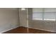 Living room with hardwood floors and neutral walls at 4034 39Th N Ave, St Petersburg, FL 33714