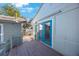 Wooden deck with blue door leading to backyard at 4135 4Th N Ave, St Petersburg, FL 33713