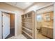 Bathroom with toilet, sink, and built-in shelving at 4135 4Th N Ave, St Petersburg, FL 33713