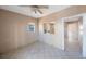 Simple dining area with ceiling fan and access to kitchen at 4135 4Th N Ave, St Petersburg, FL 33713