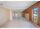 Living area with wood wall and tile floors at 4135 4Th N Ave, St Petersburg, FL 33713