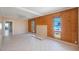 Spacious living room with wood paneling and tile floors at 4135 4Th N Ave, St Petersburg, FL 33713