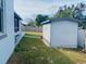 Small shed in a grassy backyard at 4209 Amber Ridge Ln, Valrico, FL 33594