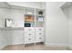 Large walk-in closet with ample shelving and drawers at 4320 Middle Lake Dr, Tampa, FL 33624