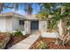 Inviting home exterior featuring a walkway and landscaping at 4320 Middle Lake Dr, Tampa, FL 33624