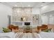 Living room with stone fireplace and built-in shelving at 4320 Middle Lake Dr, Tampa, FL 33624