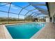 Relaxing screened pool overlooking a tranquil landscape at 4320 Middle Lake Dr, Tampa, FL 33624