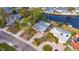 Aerial view of a single-story home with a waterfront lot at 4730 Shore Acres Ne Blvd, St Petersburg, FL 33703