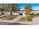 House with driveway and front yard, street view at 4730 Shore Acres Ne Blvd, St Petersburg, FL 33703