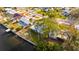 Aerial view of waterfront home with private dock and backyard at 4730 Shore Acres Ne Blvd, St Petersburg, FL 33703