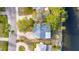 Aerial view of a waterfront house with a gray roof at 4730 Shore Acres Ne Blvd, St Petersburg, FL 33703