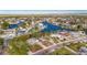 Aerial view of a house located on a canal with neighboring houses at 4730 Shore Acres Ne Blvd, St Petersburg, FL 33703