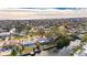 An aerial view of a waterfront home with a pool at 4730 Shore Acres Ne Blvd, St Petersburg, FL 33703