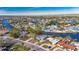 Aerial view of a waterfront home in a residential neighborhood at 4730 Shore Acres Ne Blvd, St Petersburg, FL 33703