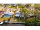 An aerial view of a waterfront home with a pool at 4730 Shore Acres Ne Blvd, St Petersburg, FL 33703