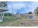 Grass yard with canal access and boat lift at 4730 Shore Acres Ne Blvd, St Petersburg, FL 33703