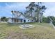 Large backyard with old pool and boathouse at 4730 Shore Acres Ne Blvd, St Petersburg, FL 33703