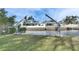 Two boatlifts on grassy area by the canal at 4730 Shore Acres Ne Blvd, St Petersburg, FL 33703