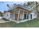 Single story home with screened porch and needs some repairs at 4730 Shore Acres Ne Blvd, St Petersburg, FL 33703