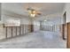 Living room undergoing renovation, showing exposed walls and flooring at 4730 Shore Acres Ne Blvd, St Petersburg, FL 33703