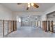 Living room undergoing renovation, showing exposed walls and flooring at 4730 Shore Acres Ne Blvd, St Petersburg, FL 33703