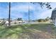 Canal view with boat lifts and neighbor's homes at 4730 Shore Acres Ne Blvd, St Petersburg, FL 33703