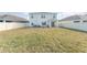 Large backyard with grassy area and patio at 5130 Adega Way, Bradenton, FL 34211