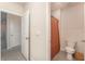 Simple bathroom with a toilet and shower at 5130 Adega Way, Bradenton, FL 34211