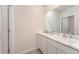 Clean bathroom with double sinks and marble countertops at 5130 Adega Way, Bradenton, FL 34211