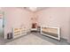 Adorable Bedroom featuring a crib and plenty of storage at 5130 Adega Way, Bradenton, FL 34211