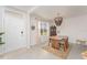 Bright dining room featuring a wood table and chandelier at 5130 Adega Way, Bradenton, FL 34211