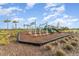 playground with play structures and wood-chip surface at 5130 Adega Way, Bradenton, FL 34211