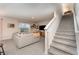 Gray carpeted stairs leading to the second floor at 5130 Adega Way, Bradenton, FL 34211