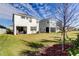 Large backyard with grassy area and home view at 5453 Del Coronado Dr, Apollo Beach, FL 33572