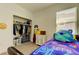 Organized bedroom with a closet, daybed, and playful decor at 5453 Del Coronado Dr, Apollo Beach, FL 33572