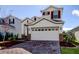 Two story house with a white garage door at 5453 Del Coronado Dr, Apollo Beach, FL 33572