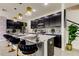 Modern kitchen with black cabinets and white countertops at 5453 Del Coronado Dr, Apollo Beach, FL 33572
