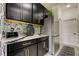 Sleek kitchen with stainless steel appliances and mosaic backsplash at 5453 Del Coronado Dr, Apollo Beach, FL 33572