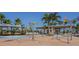 Community water park with spray features, lounge chairs, and shade structures at 5453 Del Coronado Dr, Apollo Beach, FL 33572