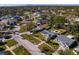 A high-angle view of the property in a suburban setting, featuring well-maintained streets and landscaping at 5600 Bayou Grande Ne Blvd, St Petersburg, FL 33703