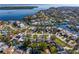 Overhead shot of homes nestled amidst waterways and lush landscapes, pinpointing the property's location at 5600 Bayou Grande Ne Blvd, St Petersburg, FL 33703