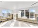 Bright and airy living room with tiled floors and view to the pool at 5600 Bayou Grande Ne Blvd, St Petersburg, FL 33703