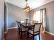 Formal dining room featuring a wood table and a chandelier at 6516 Clair Shore Dr, Apollo Beach, FL 33572