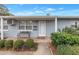 House with a covered entryway and brick walkway at 6623 16Th N St, St Petersburg, FL 33704