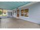 Covered porch with view into the home's interior at 6623 16Th N St, St Petersburg, FL 33704