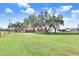 Ranch home with a large yard, plenty of green space, and mature trees at 6819 Stafford Rd, Plant City, FL 33565