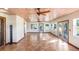 Spacious sunroom with tile floors and ceiling fans at 6819 Stafford Rd, Plant City, FL 33565