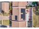 Aerial view showing home with solar panels and patio at 7262 55Th N Ave, St Petersburg, FL 33709