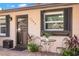 Inviting front patio with bistro set, ideal for relaxing at 7262 55Th N Ave, St Petersburg, FL 33709