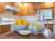 Kitchen counter with bowl of lemons and a pitcher of ice water at 7262 55Th N Ave, St Petersburg, FL 33709